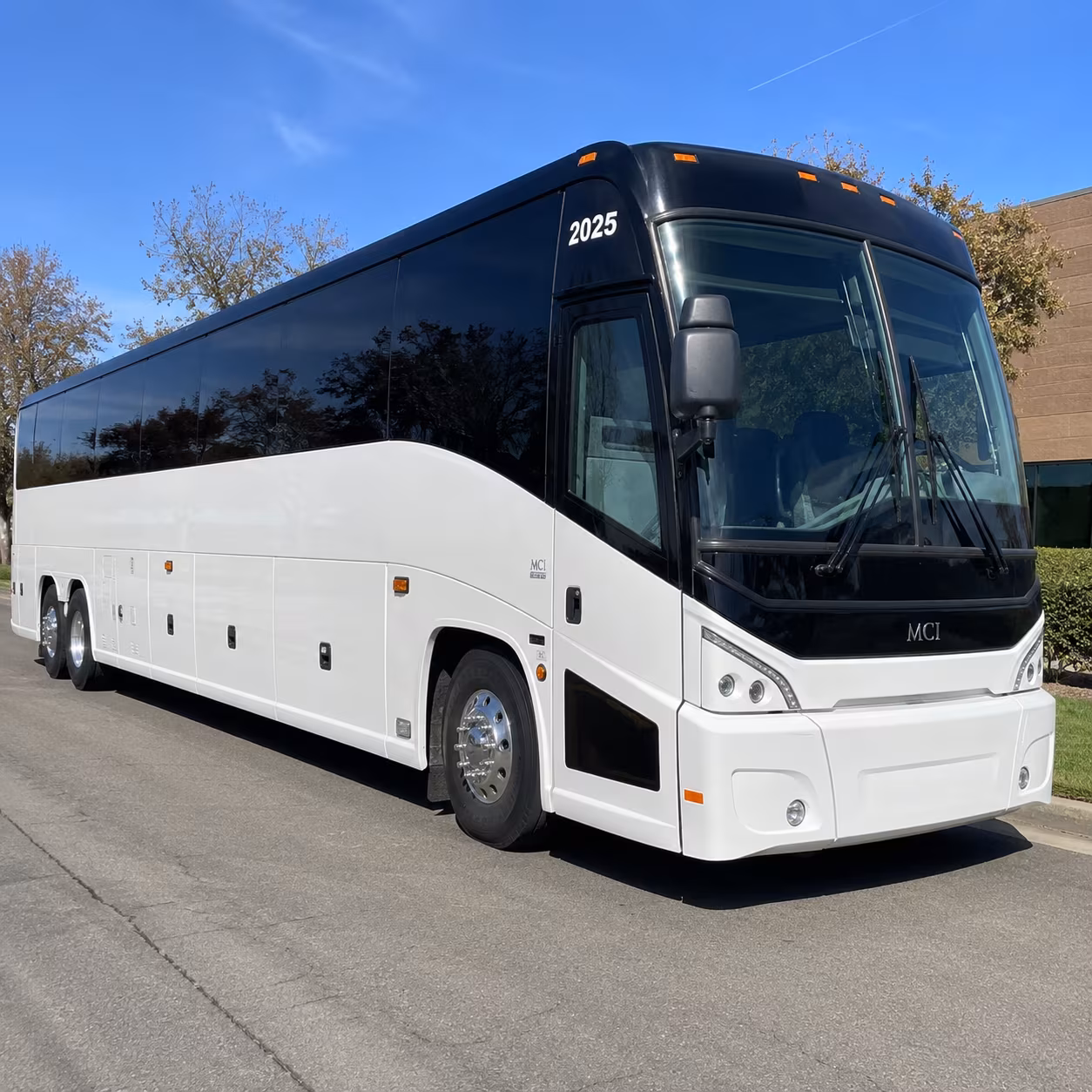 coordinating large group corporate event transportation at barker hangar and beyond